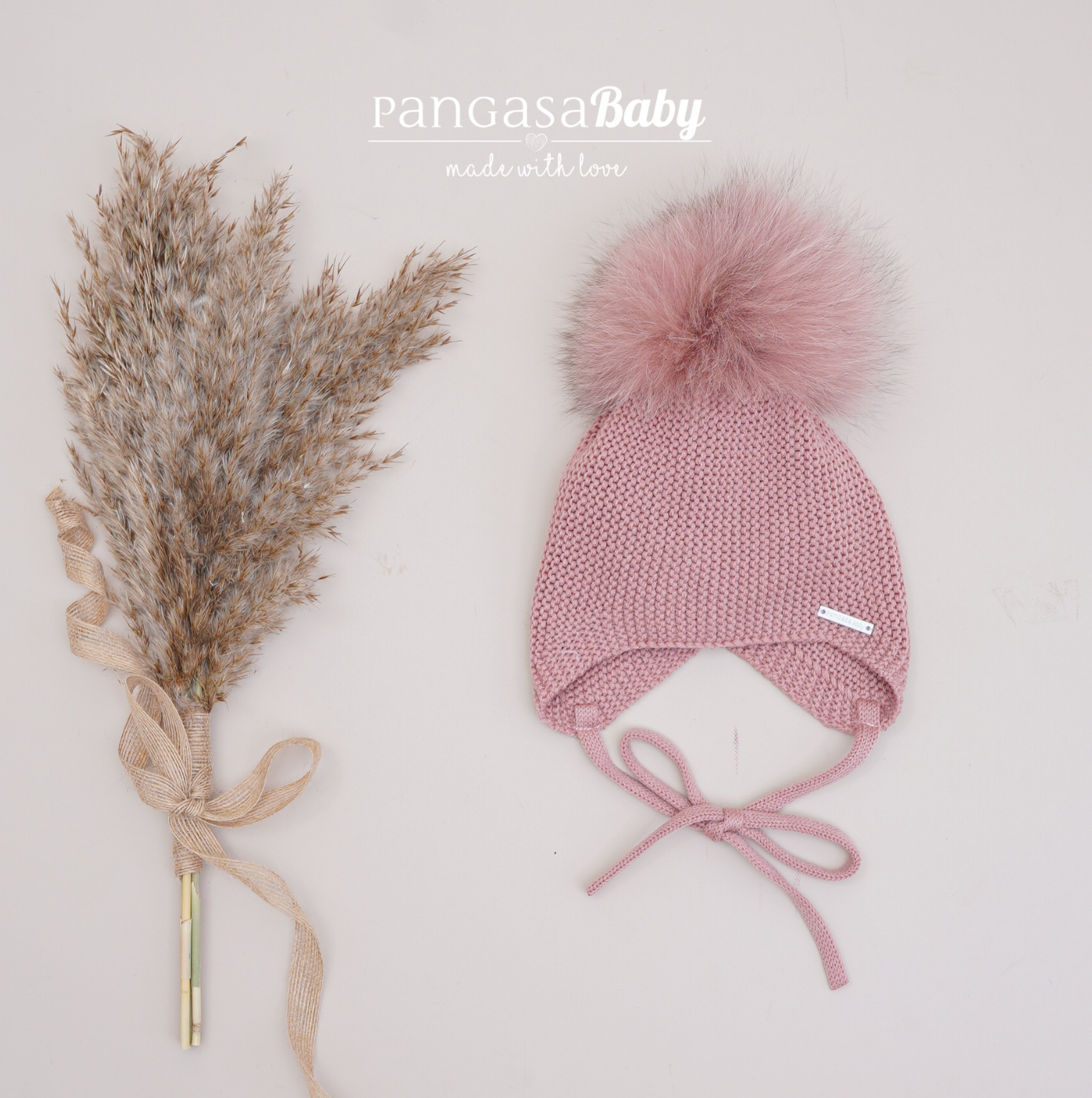 Pangasa - Luxurious Knit Hat with Fur Pompom and Tie (rosé)